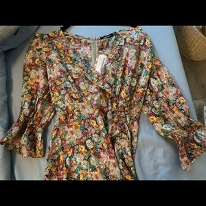 Floral cinched side quarter length dress